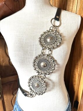 Chico’s leather and silver belt.